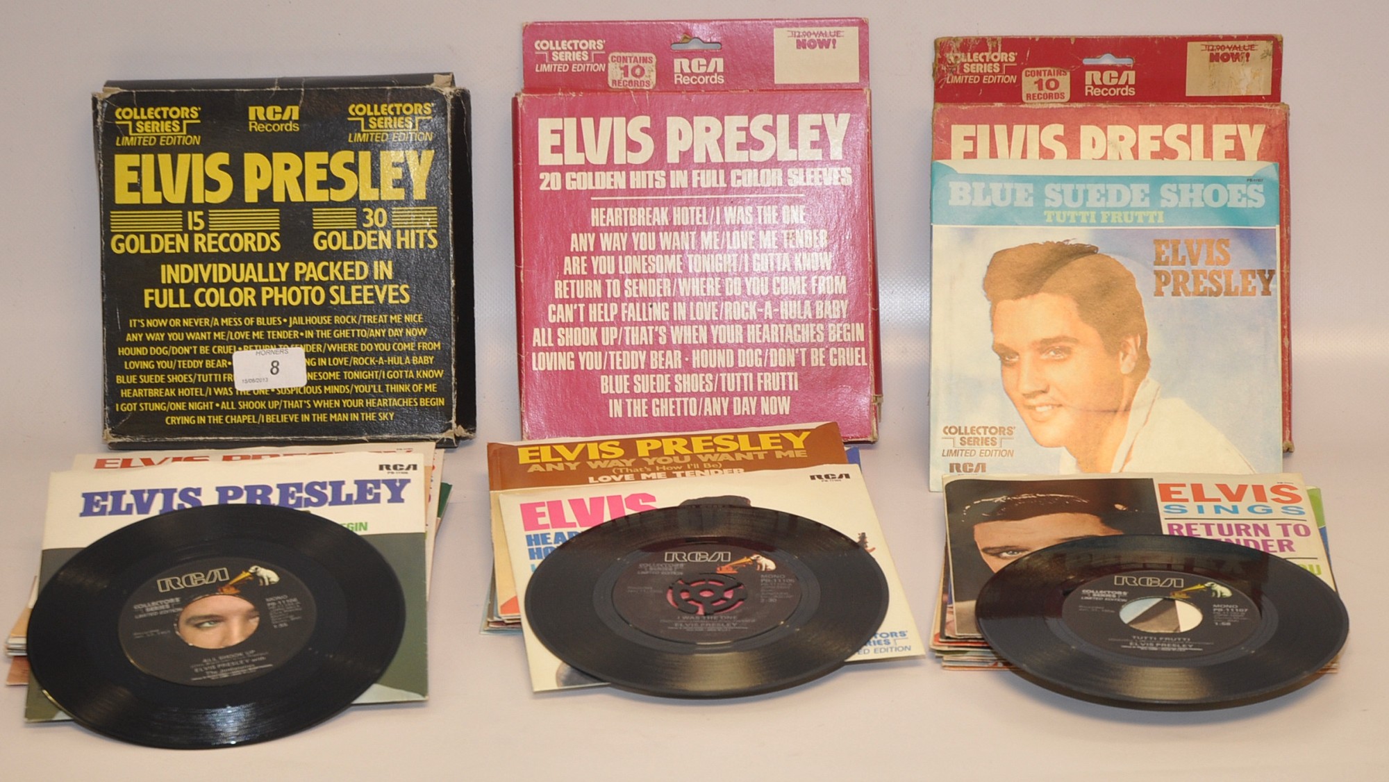 ELVIS - `15 GOLDEN RECORDS` - SET SINGLES IN CARD CASE.  PLUS `20 GOLDEN HITS` - SINGLES IN CARD