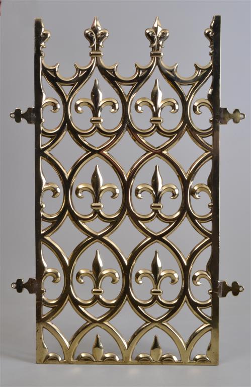 A Victorian cast and pierced gilt brass Gothic Revival door grille by John Hardman & Co, made for