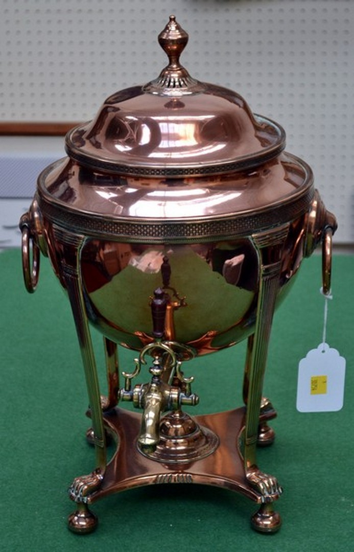 A 19th century copper urn of classical form, basket weave banded decoration, cover fitted urn