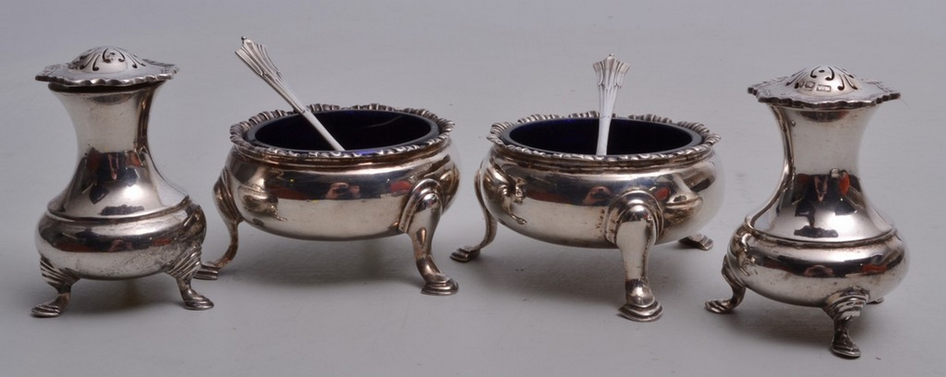 A pair of 18th century silver cauldron type table salts, together with a pair of 20th century