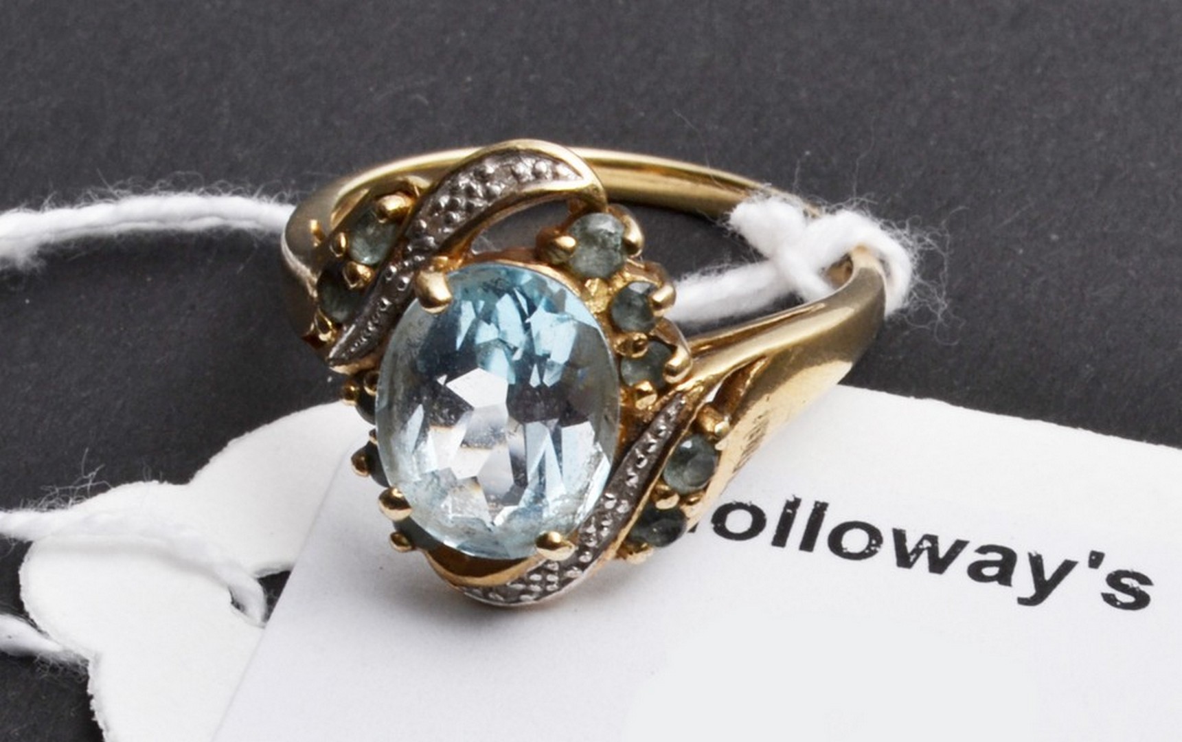 An aquamarine, diamond and possibly blue topaz ring