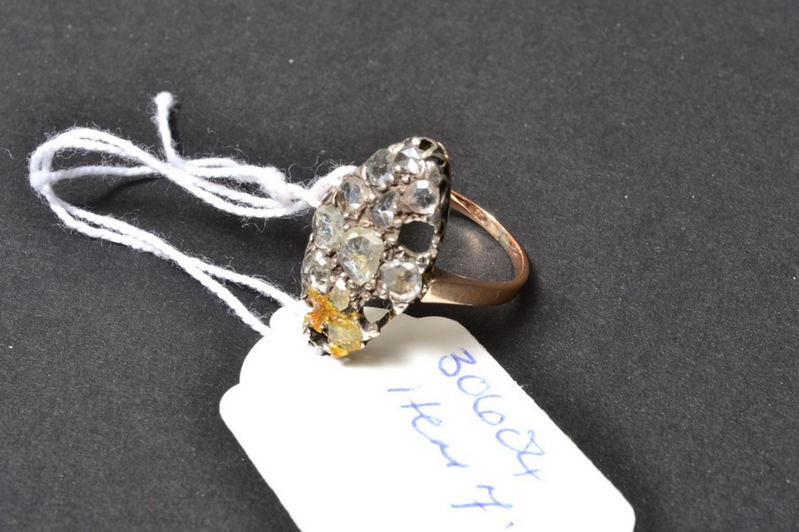 A 19th century diamond set ring, the lozenge-shaped plaque set throughout with mixed old-cut