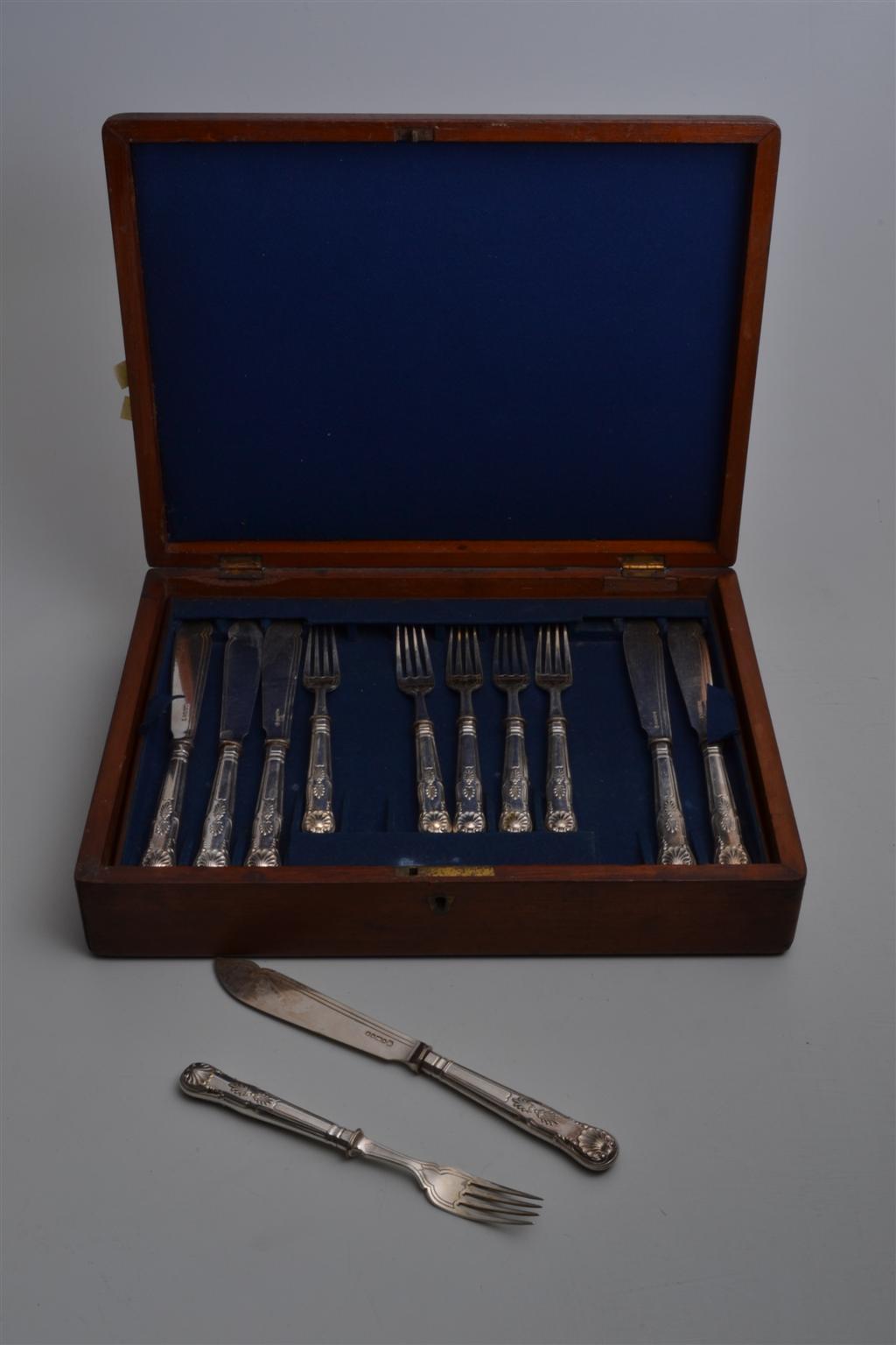 A mahogany cased set of twelve silver plated fish knives and forks