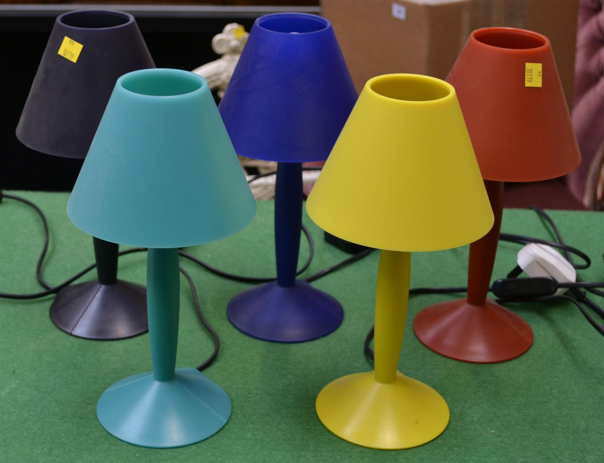 A collection of five `Miss Sissi` table lamps, designed by Philippe Starck, plastic, in