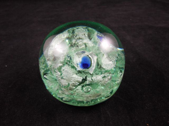 A Kilner glass paperweight with blue flower heads, impressed mark to base - H6.5cm
