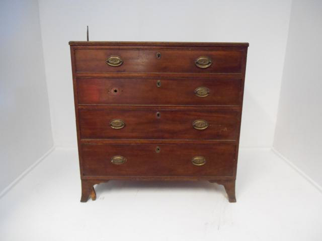 An early 19th century mahogany chest of four graduated long drawers, brass oval handles - W92cm