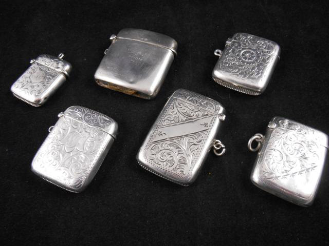Five engraved silver vesta cases, together with one other vesta case - approx weight 158g/5.1 troy