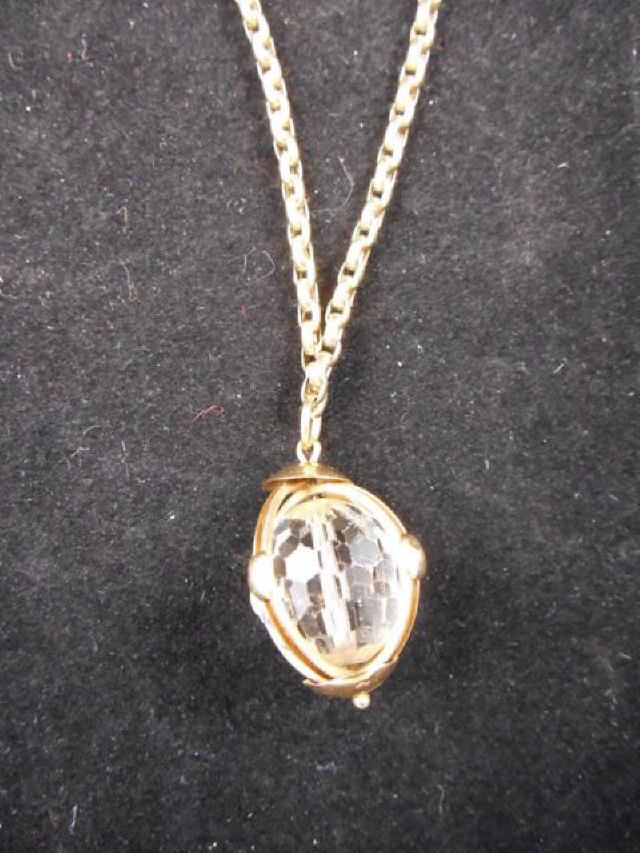 A 9ct gold pendant with crystal ball, on 80cm 9ct gold necklace - approx gross weight 28.4g