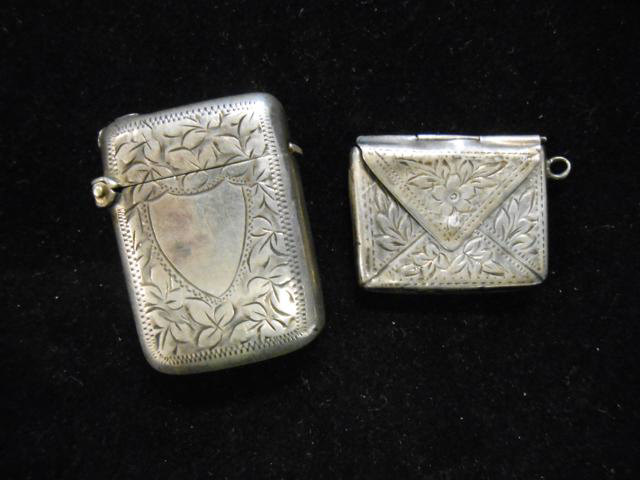 An engraved silver vesta case, Birmingham hallmark, together with a silver envelope stamp case