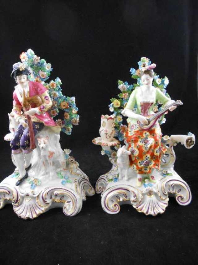 A pair of Samson figures of a gentleman bagpipe player and companion playing lute, Rococo style