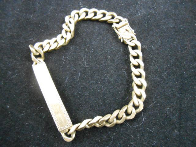 A .375 gold chain-link identity bracelet, uninscribed -  approx weight 30.9g