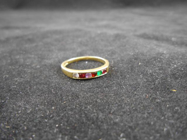 A .750t gold `regard` ring, set with ruby, emerald, garnet, amethyst, ruby and diamond - approx