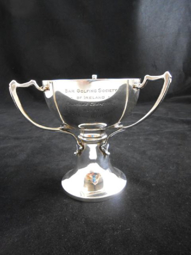 An Arts and Crafts style three handled silver trophy inscribed `Bar Golfing Society of Ireland,