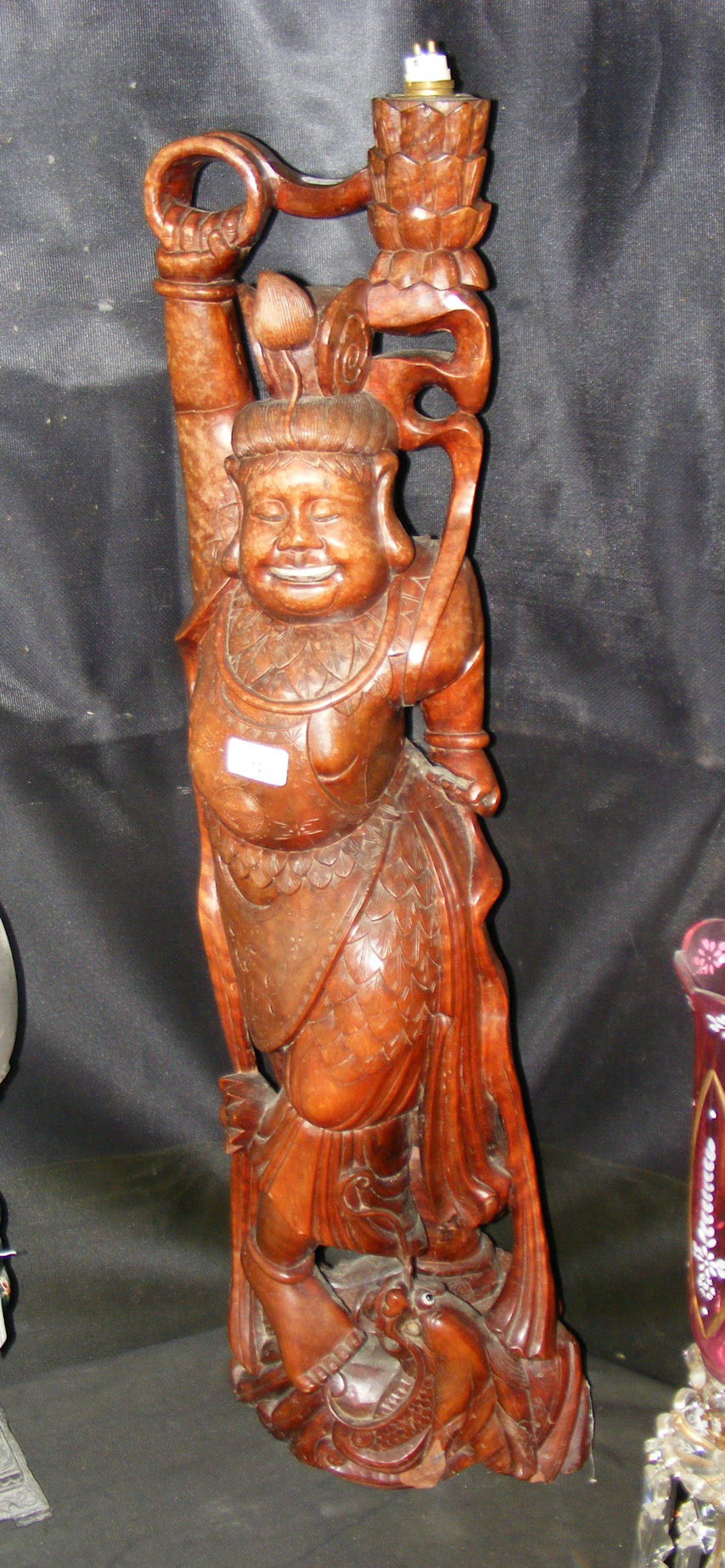 A carved oriental figure of dancing lady - converted to lamp