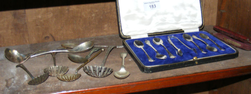 A cased set of silver coffee spoons and tongs, sifter spoons, spectacles etc.