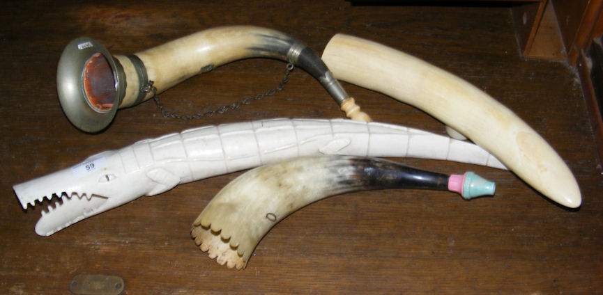 An old carved tusk, horn etc.