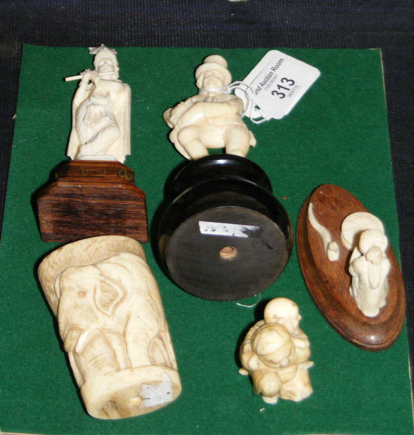 Five assorted items of oriental, African and European carved ivory including a Sam Weller figure,