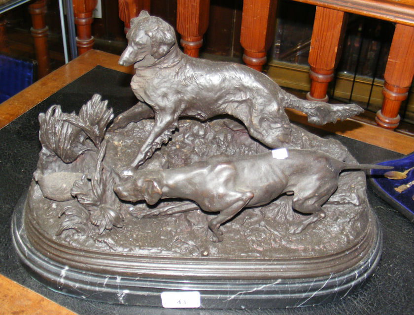 An antique style metal hunting group on marble base