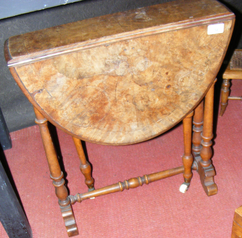 A small proportioned Victorian walnut Sutherland table