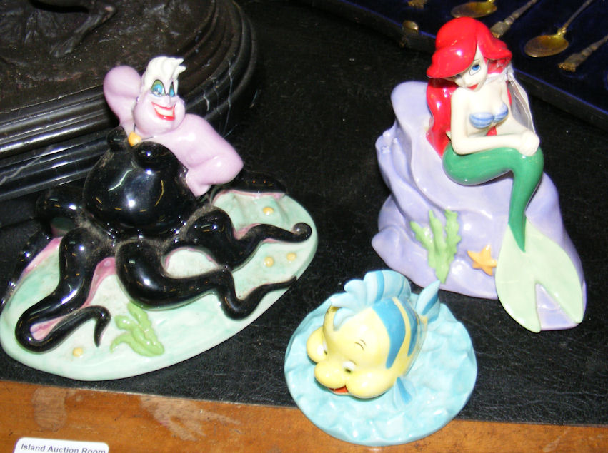 A Royal Doulton Disney “Little Mermaid” figurine “Ursula”, together with “Ariel” and “Flounder”