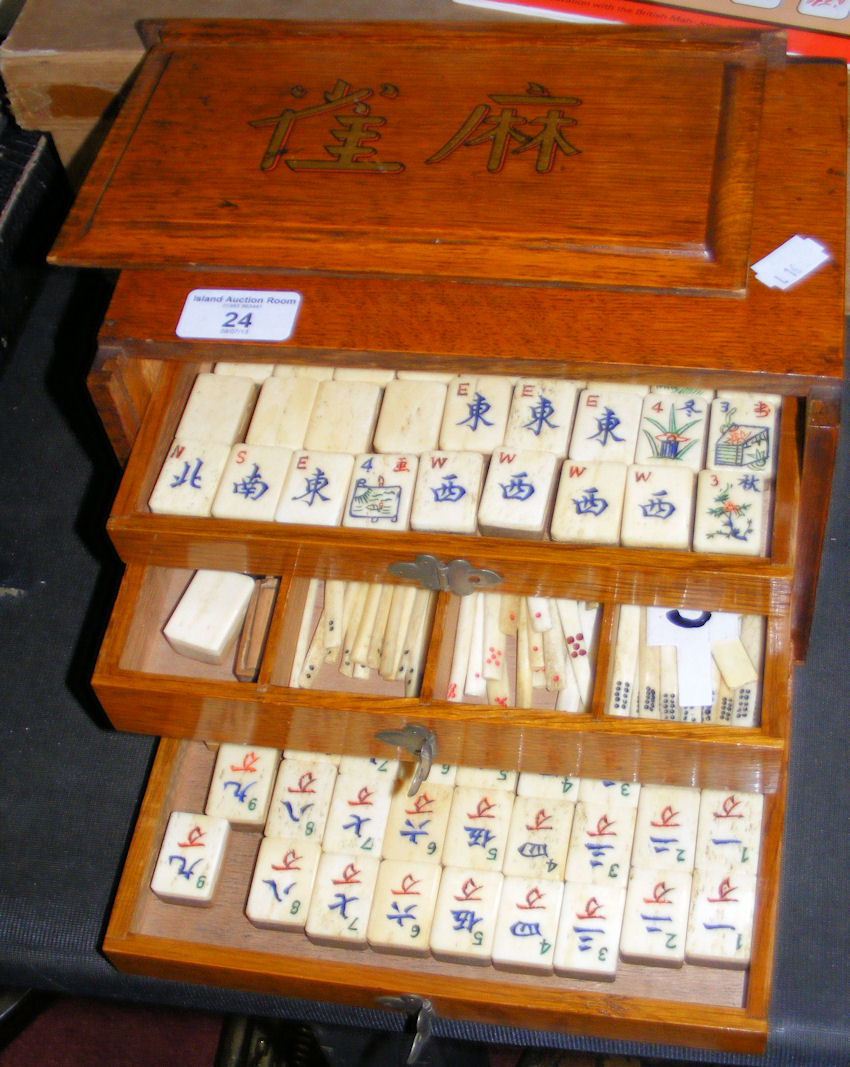 A Mah-jong set in fitted wooden case with stands