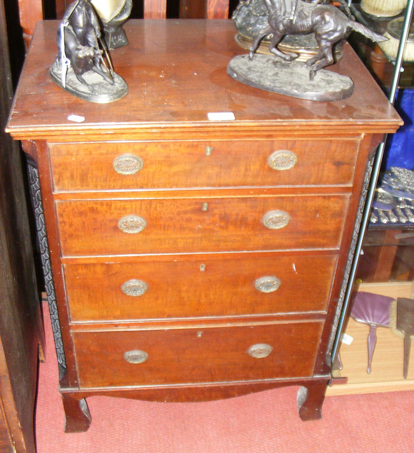 A mahogany chest of four long graduated drawers