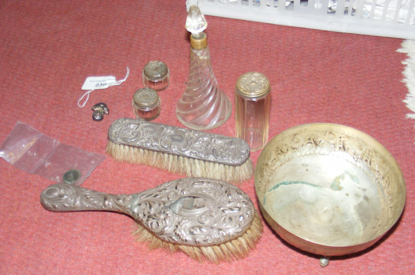 Two silver backed brushes, silver topped jars, bowl, etc