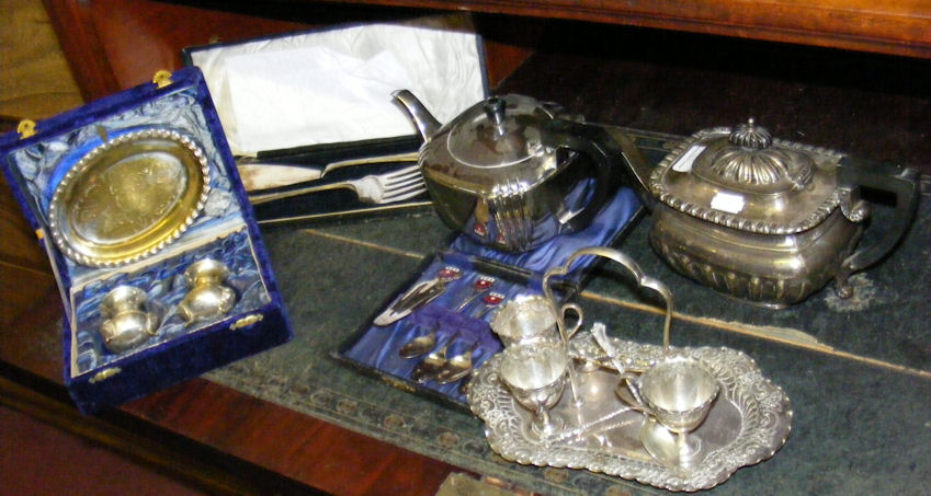 A quantity of assorted plated ware, including teapots, egg cruet etc.