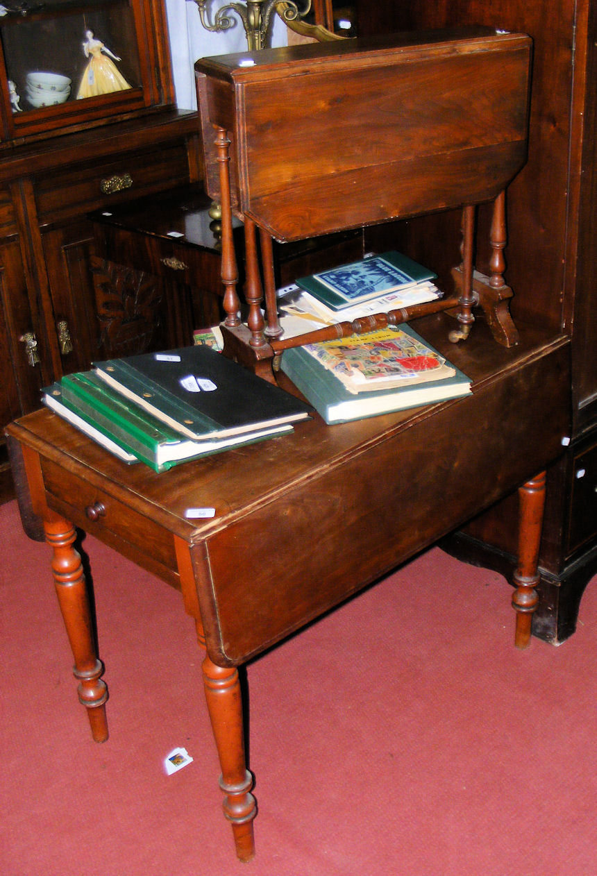 A Victorian mahogany Pembroke table and a small walnut Sutherland table