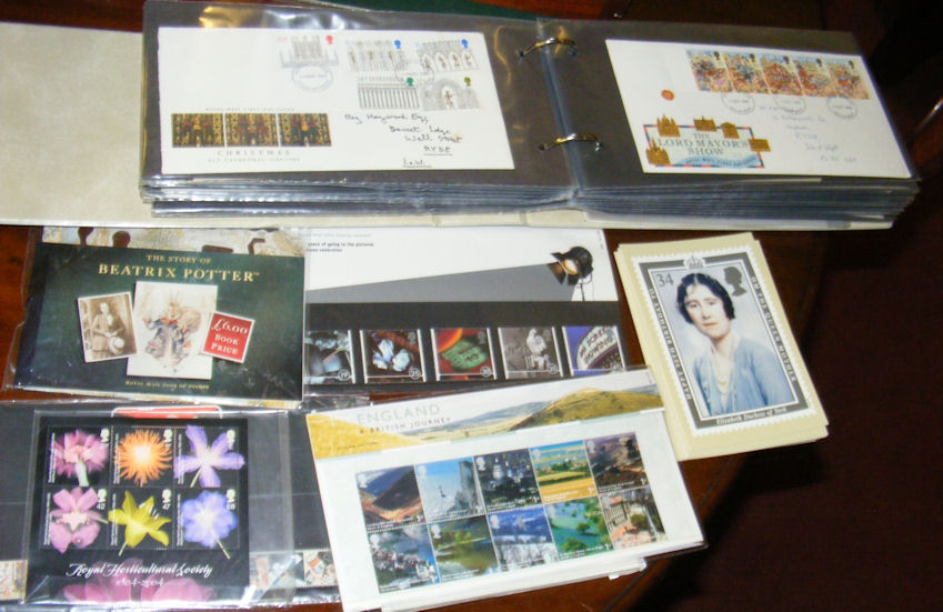 Albums containing a selection of First Day Covers, together with various loose stamps