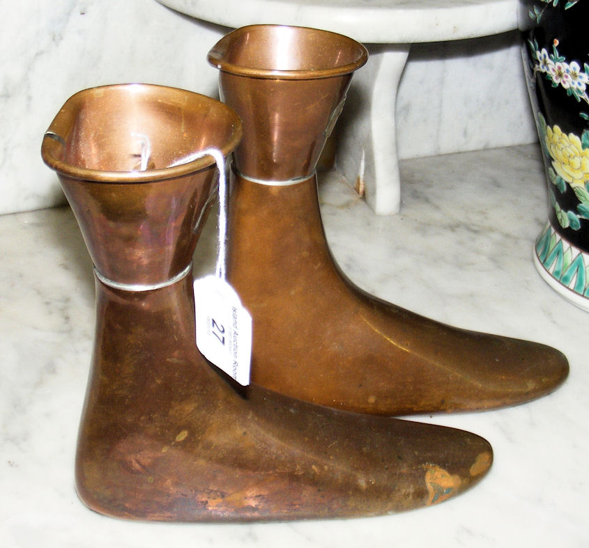 A pair of Edinburgh made copper boot warmers, complete with stoppers