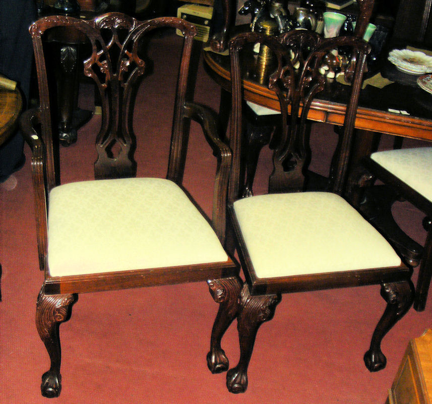 A set of six antique style dining chairs with cabriole front supports