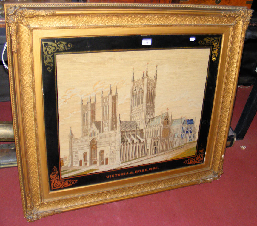 A 67cm x 79cm framed and glazed cathedral tapestry inscribed “Victoria A Rose - 1866”