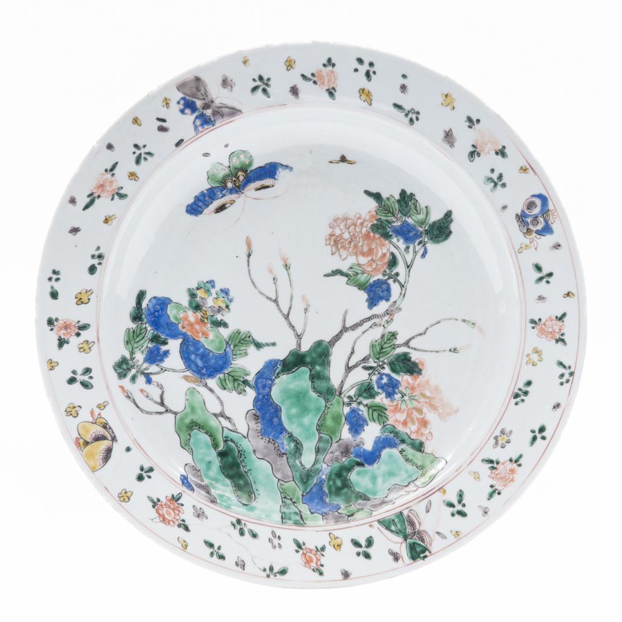 A famille-verte dish, beautifully decorated with 4 buterflies on the rim amid little flowers; 2