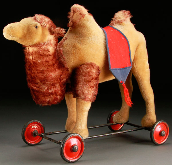 A STEIFF CAMEL PULL TOY, MID 20TH CENTURY. With made in US-Zone Germany tag. Height 17.25 inches (