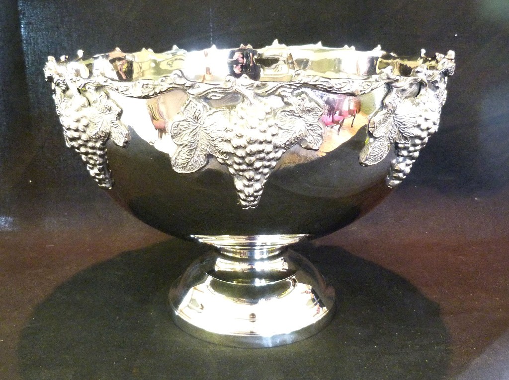 A Silver Plated Large Pedestal Punch Bowl, decorated in relief with grapevine, 40cms diameter