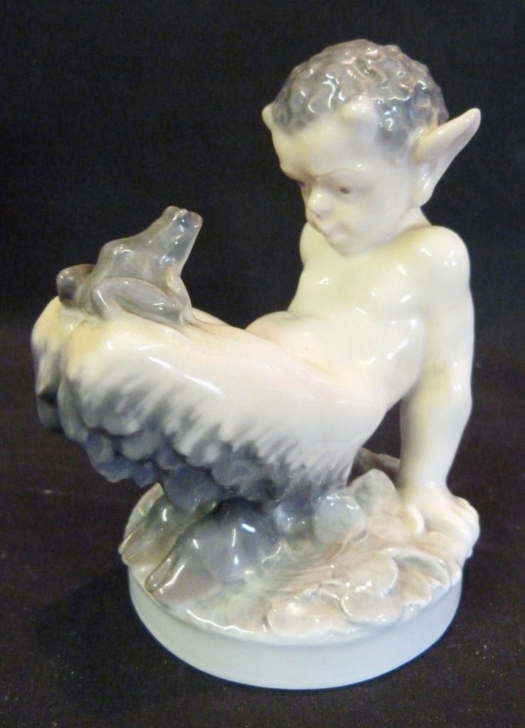 A Royal Copenhagen Porcelain Model, in the form of a boy with a frog