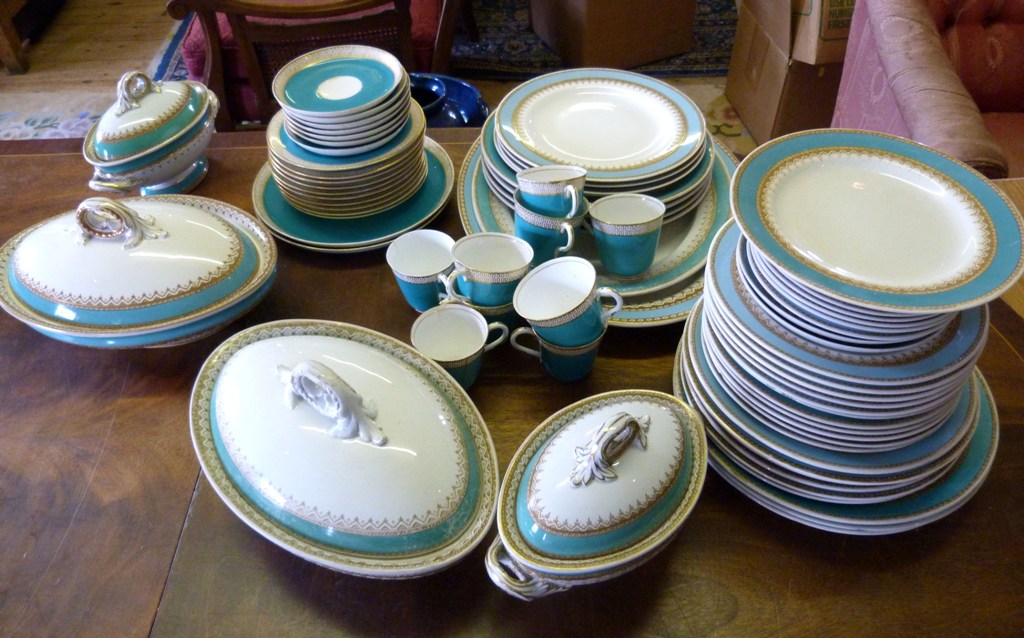 A Royal Worcester Dinner Service, comprising various tureens, plates, meat platters, cups and