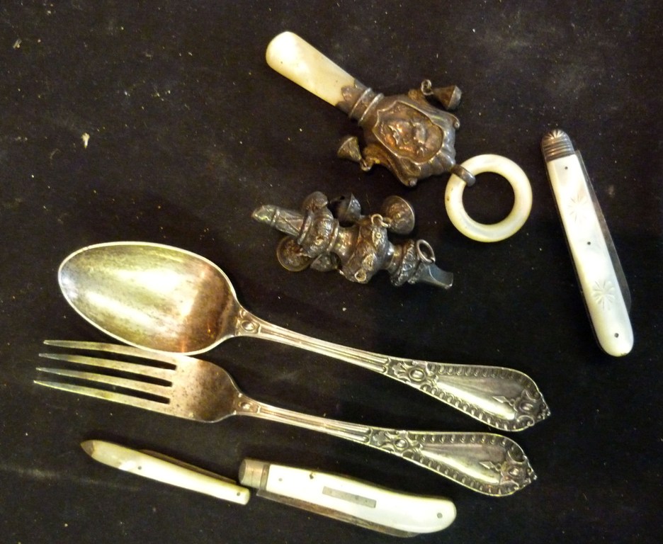 A Victorian Silver Spoon and Fork, together with two silver and mother-of-pearl baby`s rattles and