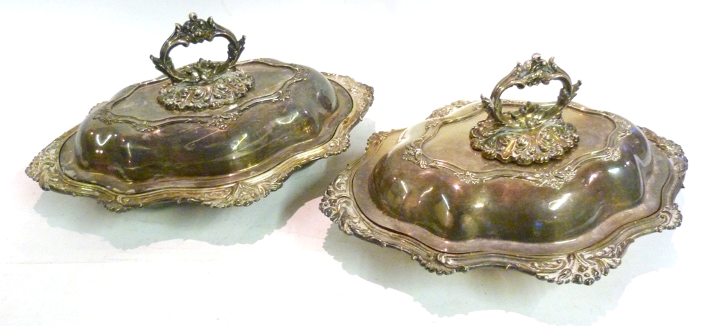 A Pair of Silver Plated Entree Dishes, Covers and Handles, of shaped outline