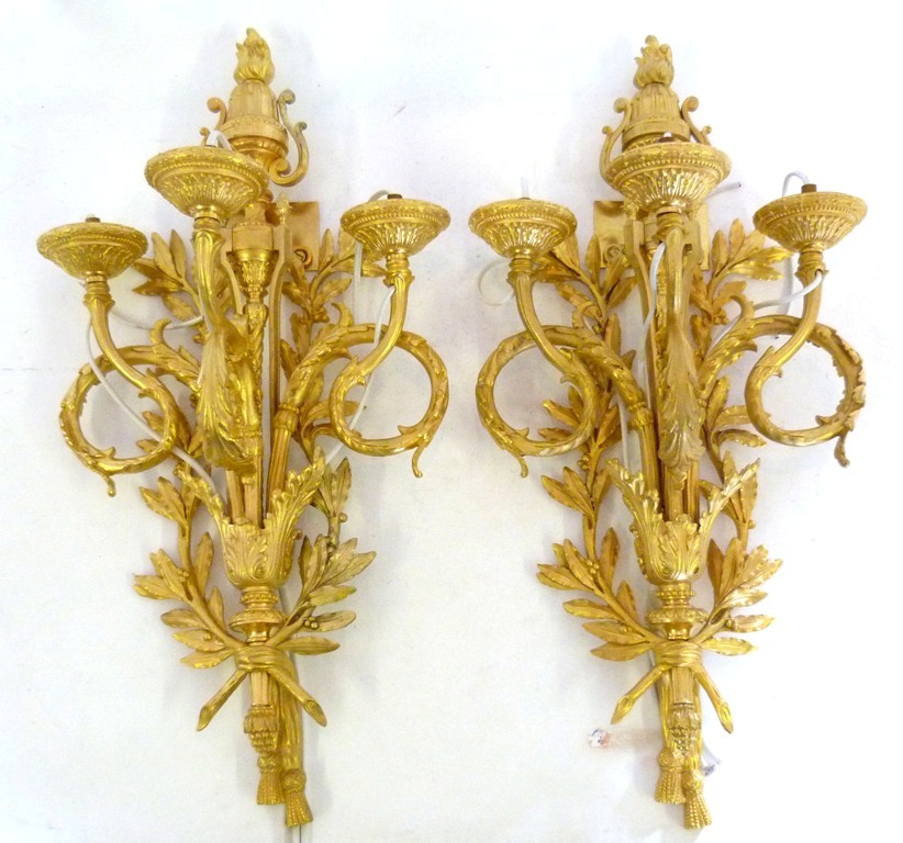 A Pair of Large Gilt Metal Three Branch Wall Sconces, of scrolling tassel form 54cms high
