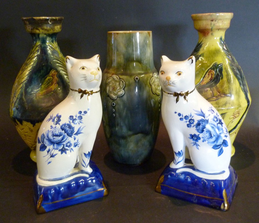 A Royal Doulton Stoneware Vase, together with a pair of naive pottery vases and a pair of