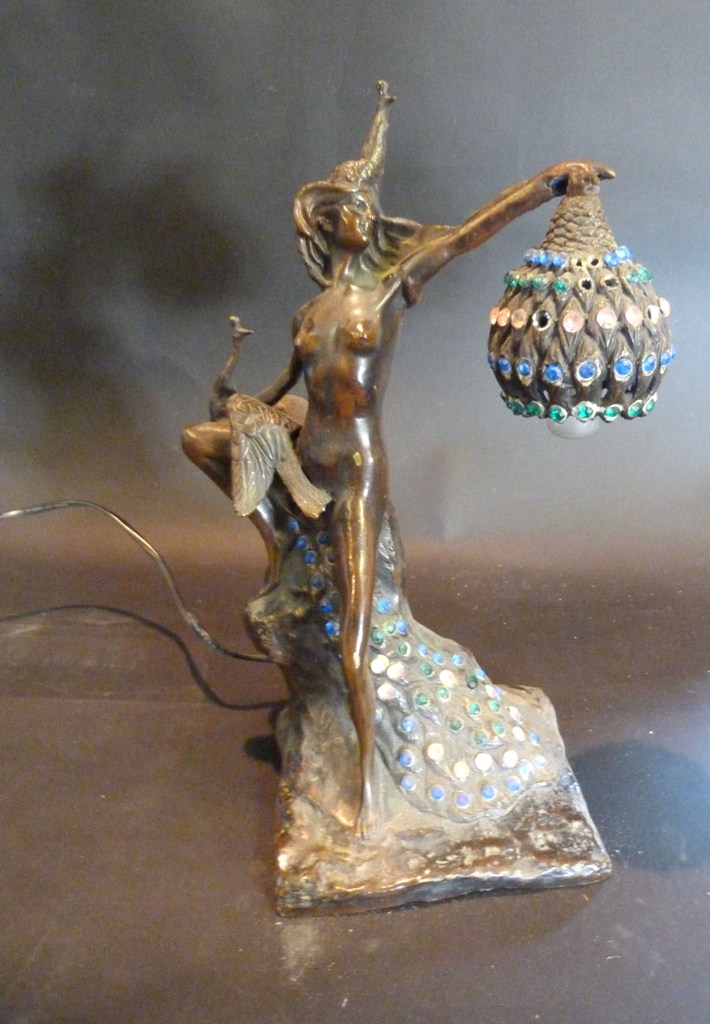 A Patinated Bronze Table Lamp, in the form of a classical female, 37cms high
