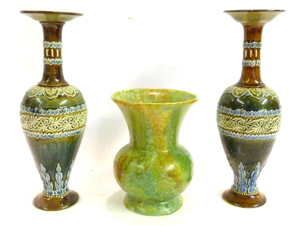 A Pair of Royal Doulton Stoneware Bottleneck Vases of Oviform, decorated in relief upon a mottled