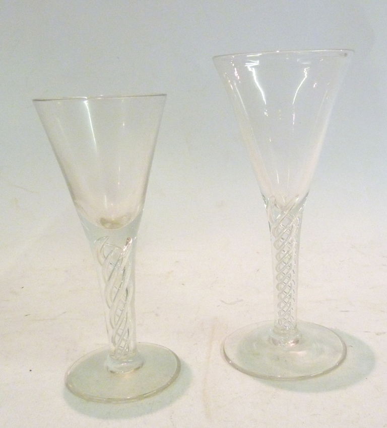 A 19th Century Cordial Glass, with spiral twist stem, together with another similar