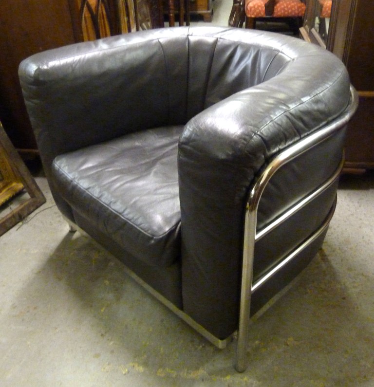 A Contemporary Grey Leather and Stainless Steel Tub Shape Chair