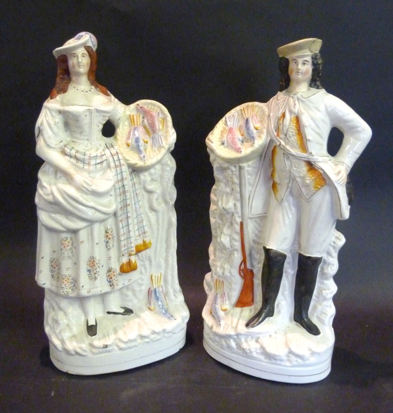 A Pair of 19th Century Large Staffordshire Models, of a lady and gentleman, 38cms high