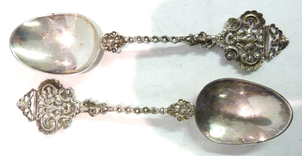 A Pair of Continental Silver Serving Spoons, with foliate pierced handles, import marks Chester 1912