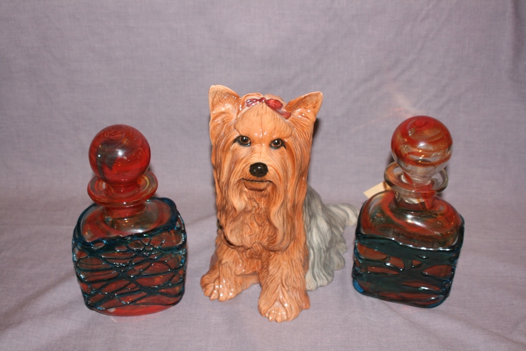 A Beswick Pottery Fireside Model of a Yorkshire Terrier, together with a pair of Mdina Glass