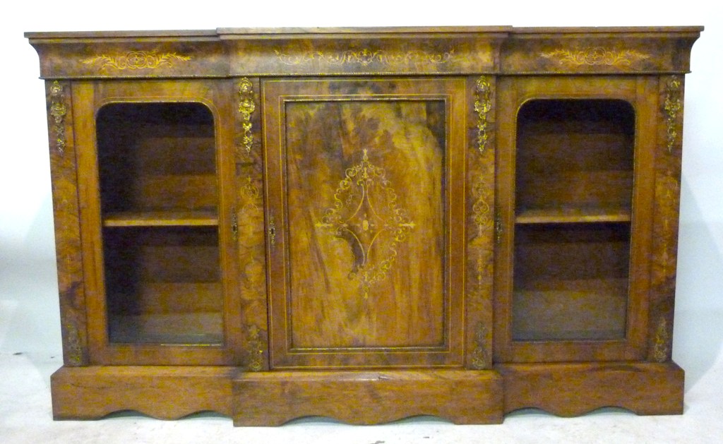 A Victorian Walnut and Marquetry Inlaid Gilt Metal Mounted Breakfront Credenza, with a central